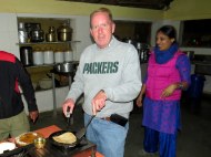 I'm giving our group a lesson on making proper chapati!