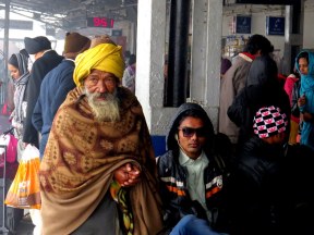 A land of contrast. Old man and hipster at the Agra train station.